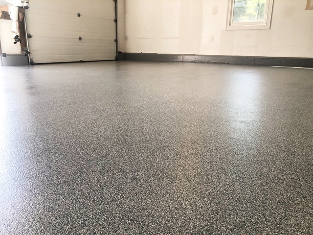 Examples of epoxy flooring in a business Epoxy flooring in in New London, Connecticut